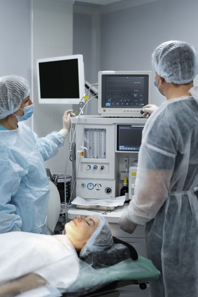 doctors-monitoring-patient-s-pulse-min